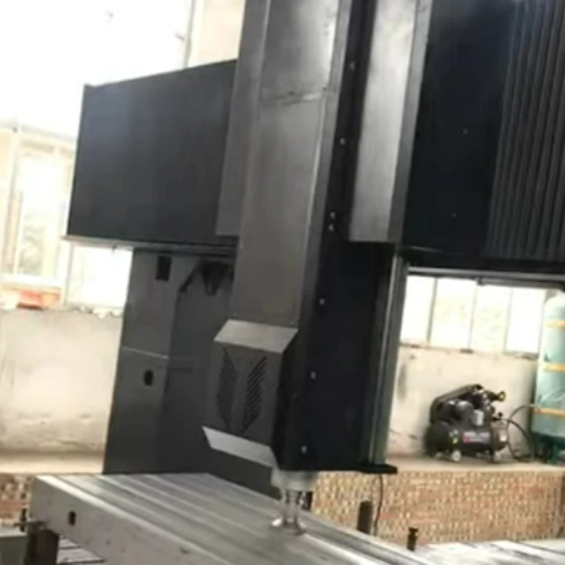 T Slot platforması CNC kompüter ədədi idarəetmə emalının altındadır